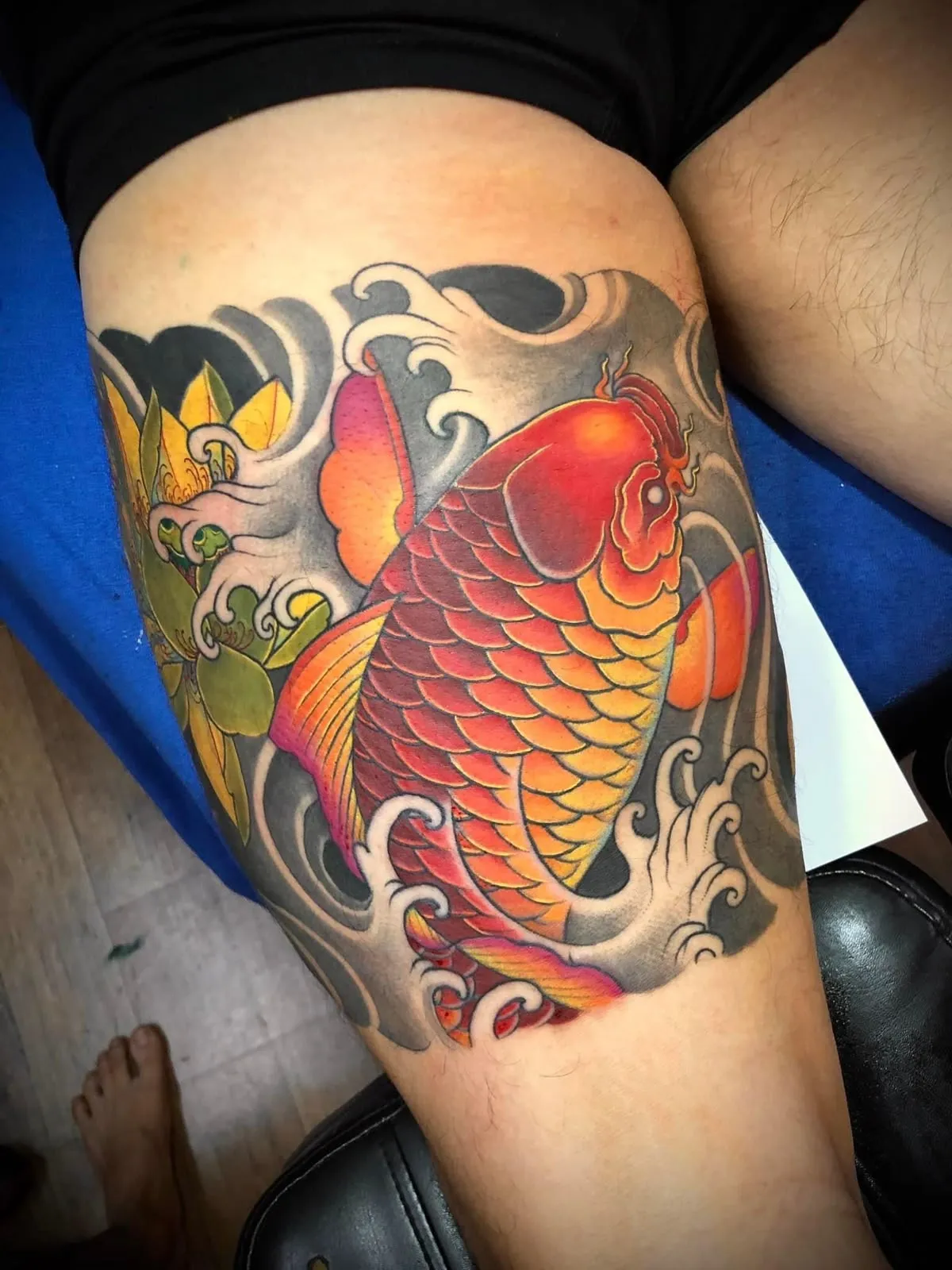 Collection of beautiful carp tattoos on the thighs leading the 2025 trend